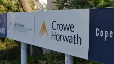 Crowe Howarth image of sign with company logo